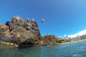 jumping off the rocks in Kaanapali, Maui